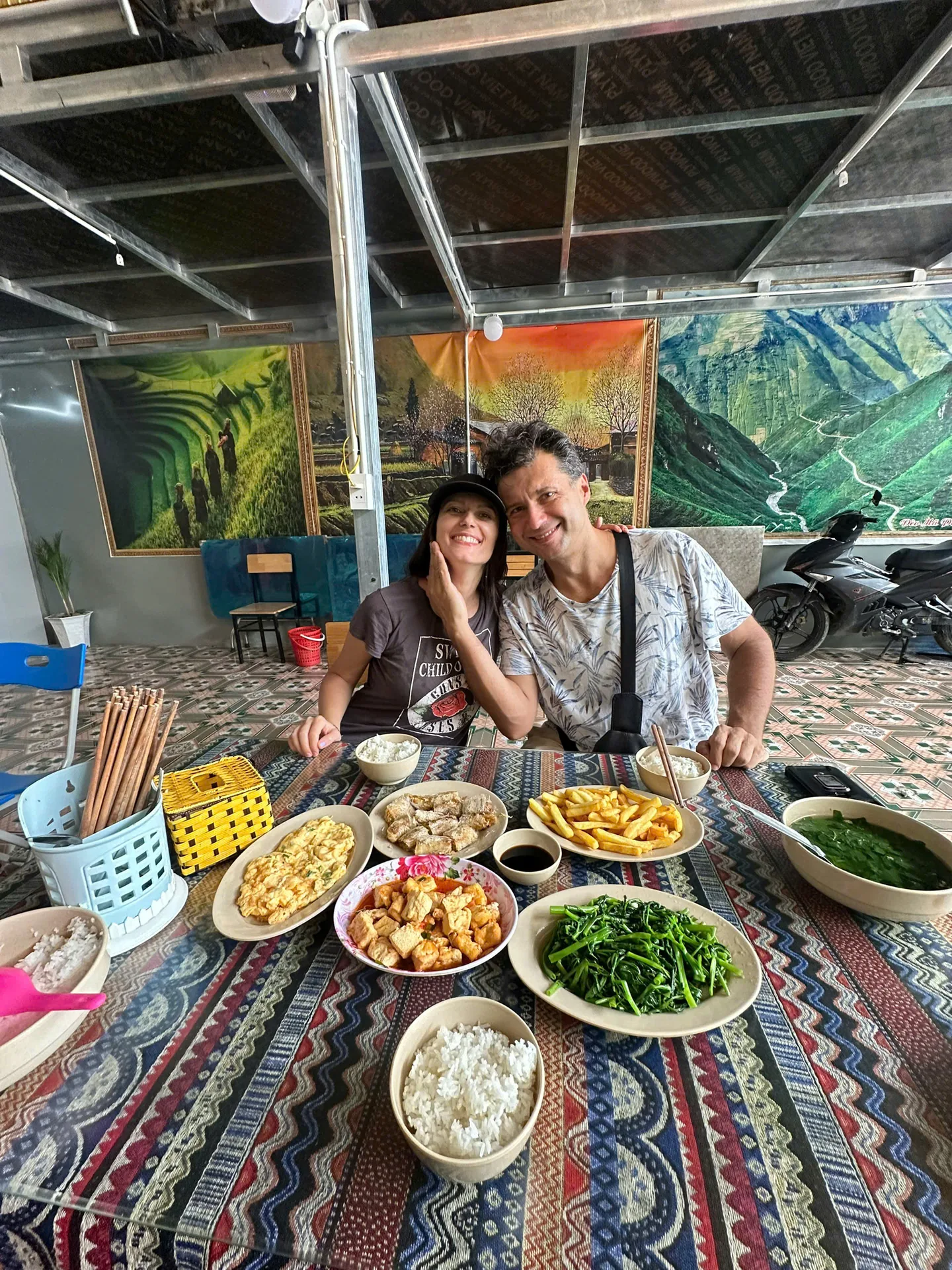 A couple sharing dinner at a homestay